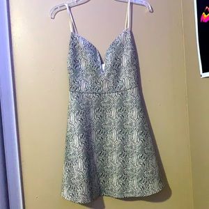 Snake Print skinny strap dress that stops right above the knee!🤍